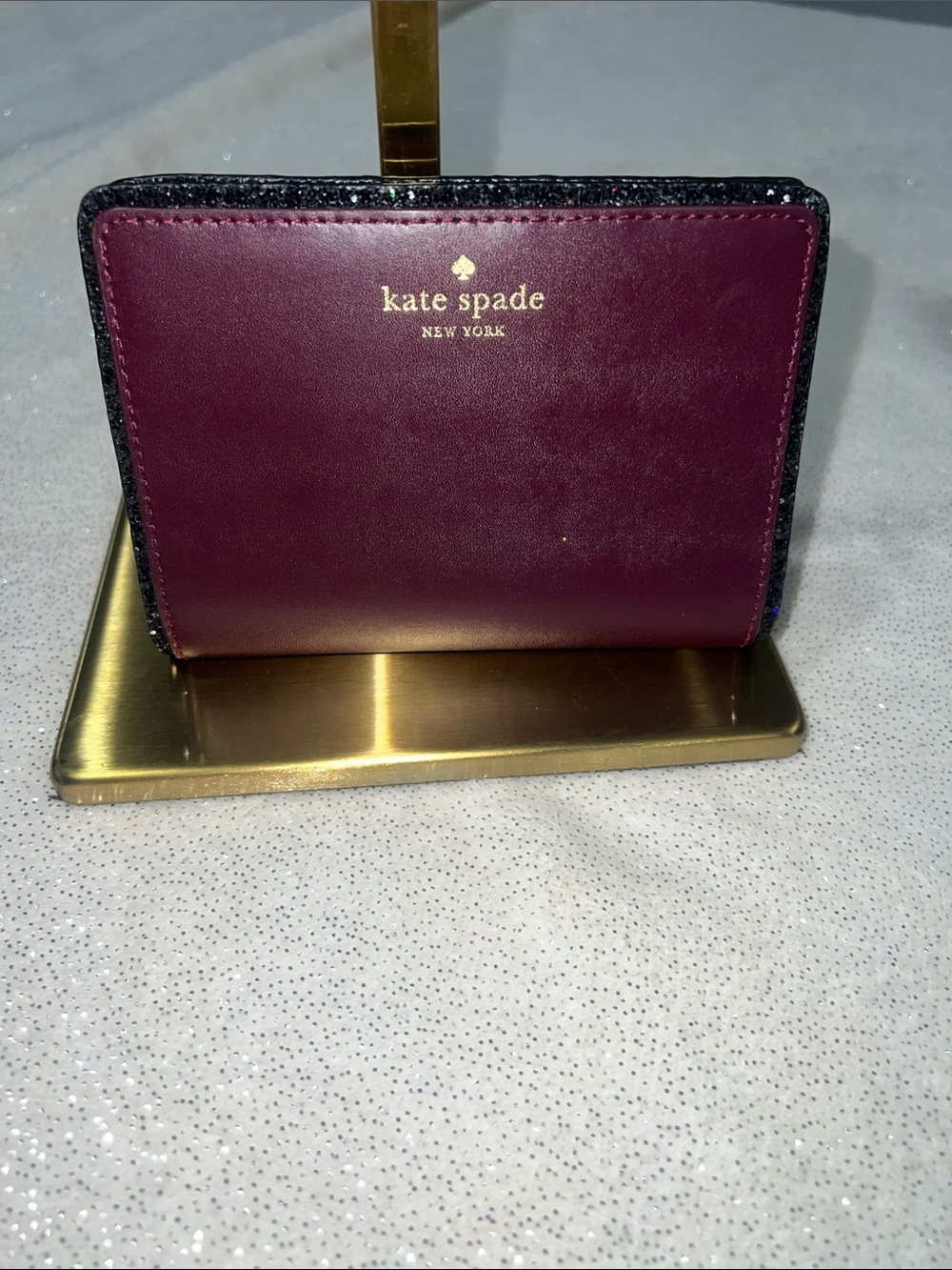 kate spade wallet in deep plum . EUC